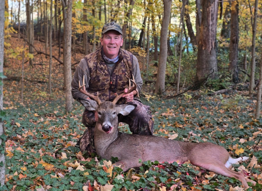 Senator Jon Husted poses with a buck