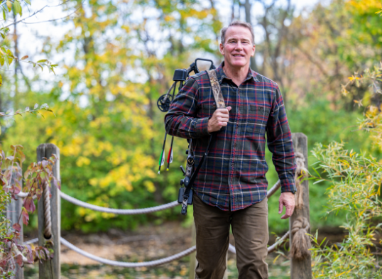 Senator Jon Husted walking outdoors